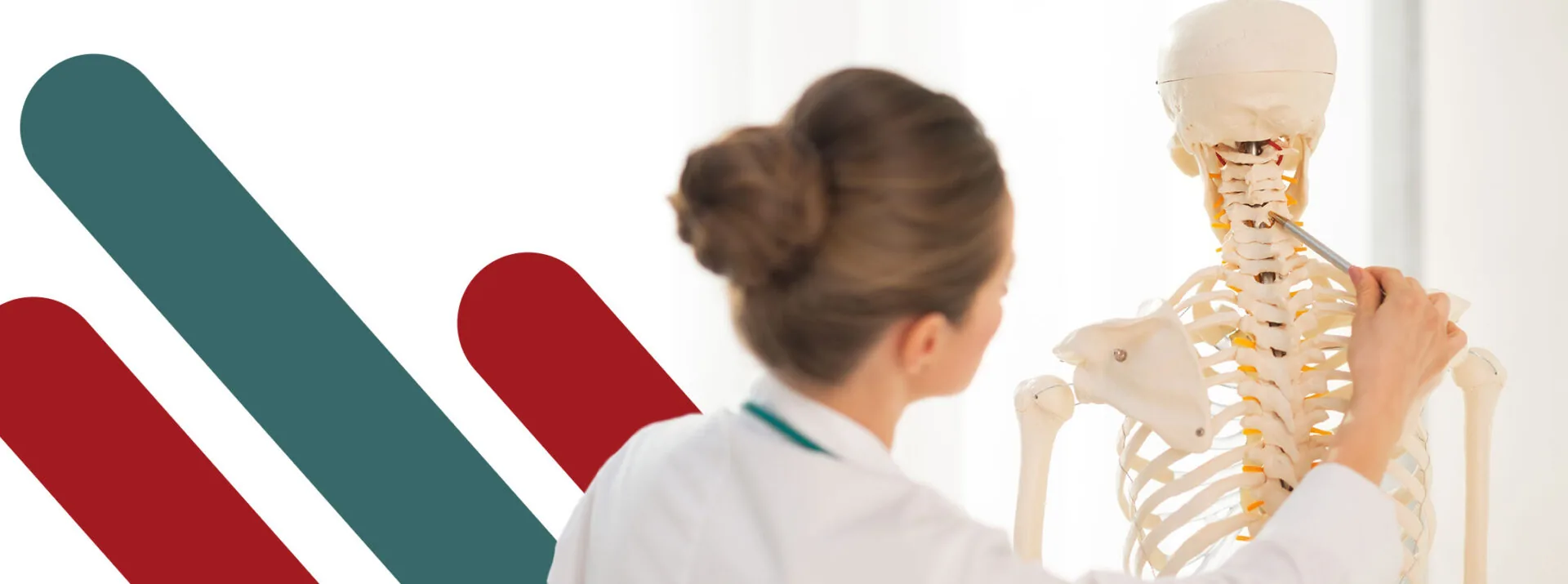 Paolo Sanzo demonstrating a spinal assessment technique to a group of physiotherapists